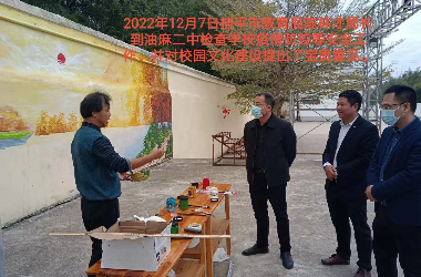  乐提升官网（中国）科技公司美术教师到油麻二中绘制艺术墙活动